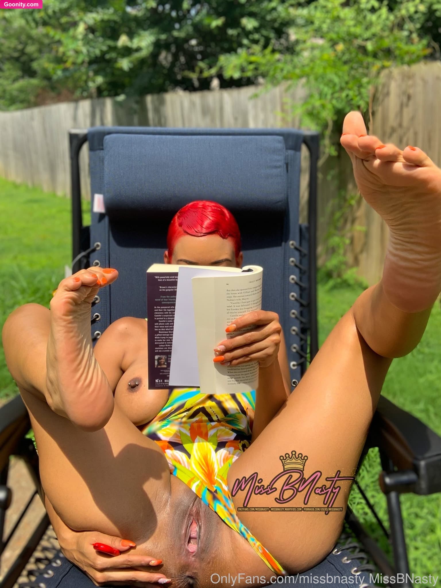 MissBNasty on OnlyFans - I was catching some sun and reading, but I think I’m about to rub one out in the backyard, I hope the neighbors don’t catch me.